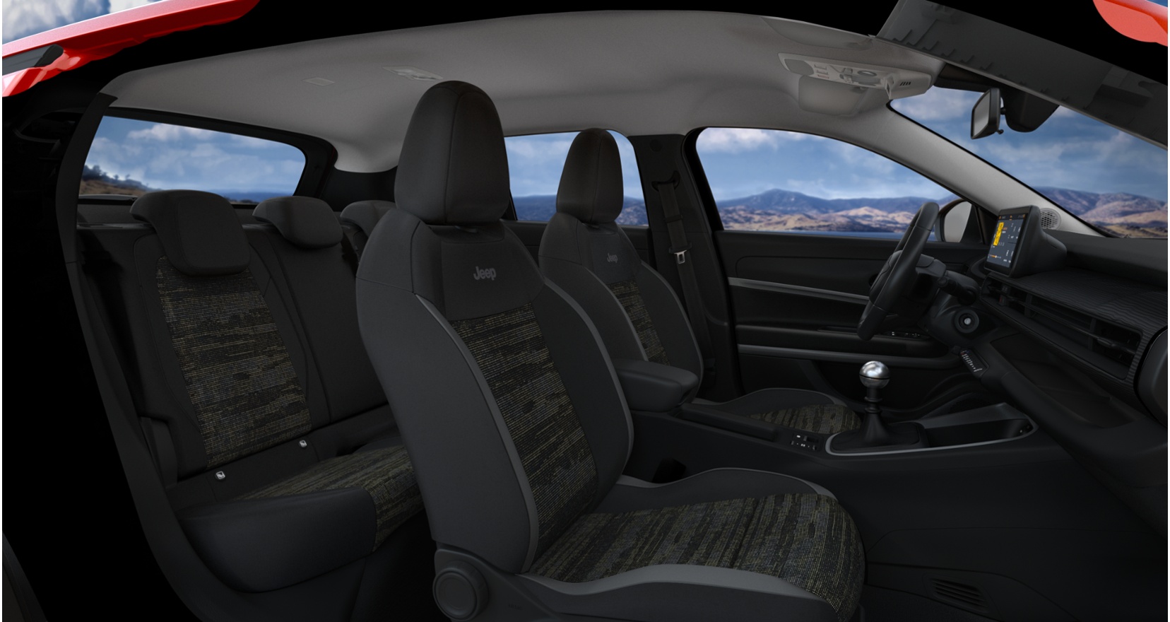 Vue de l'intérieur spacieux et confortable de la Jeep Avenger, mettant en avant les sièges modernes et la technologie embarquée