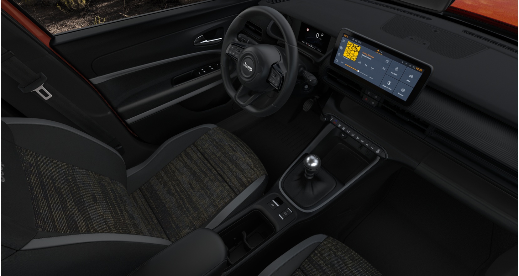 Vue de l'intérieur de la Jeep Avenger, avec tableau de bord moderne et sièges confortables