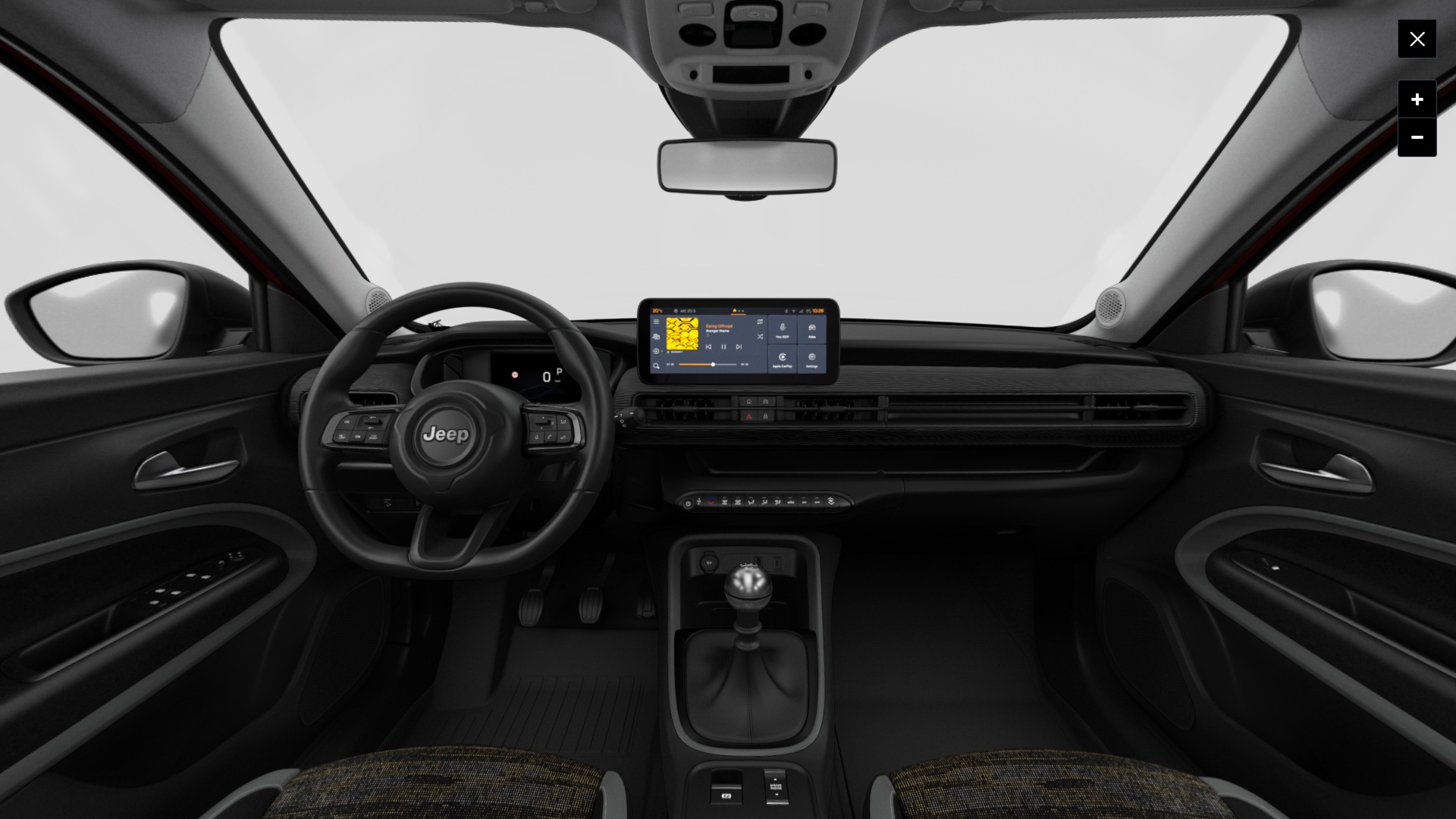 Vue de l'intérieur moderne et connecté d'une Jeep Avenger, avec tableau de bord et écran de contrôle avancé